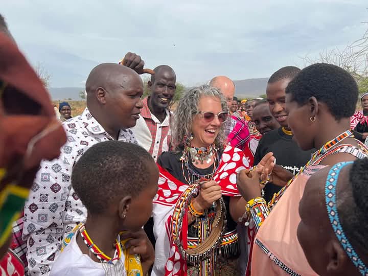 Happily interacting with team from USA and church members after a powerful service and giving out some relief food in 2022