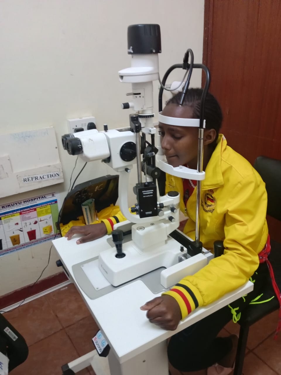 Taking one of the sponsored girls for eye check up.